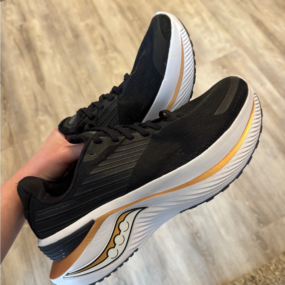 Saucony Black and Gold Athletic Shoes